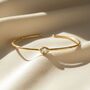 18ct Gold Plated White Topaz April Birthstone Bangle, thumbnail 1 of 5