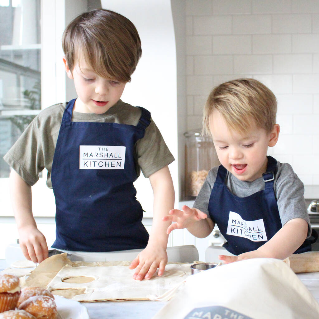 'The Surname Kitchen' Children's Baking Apron, 1 of 4