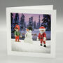 Santa And Elf Make A Snowman, thumbnail 1 of 2