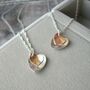 Silver And Rolled Gold Hearts Necklace, thumbnail 1 of 9