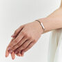 Personalised Sparkling Petite Cosmic Star Bar Bracelet In Silver, thumbnail 5 of 10
