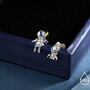 Mismatched Astronaut And Rocket Stud Earrings In Sterling Silver With Simulated Moonstone, thumbnail 1 of 11