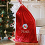 Personalised Santa Gift Sack With Christmas Cottage Design, thumbnail 1 of 6