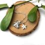 Personalised Serling Silver Jingle Bell And Initial Star Christmas Necklace, thumbnail 2 of 12