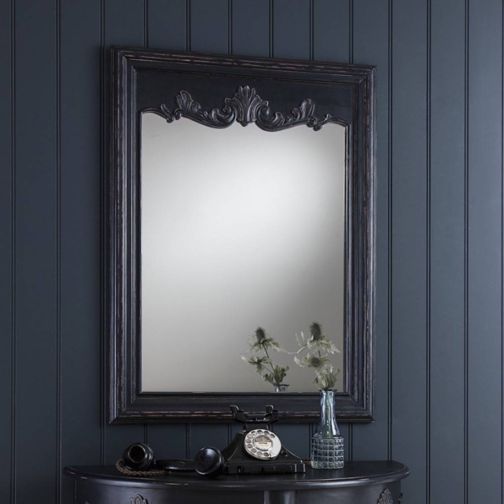 black vintage ornate wall mirror by the forest & co