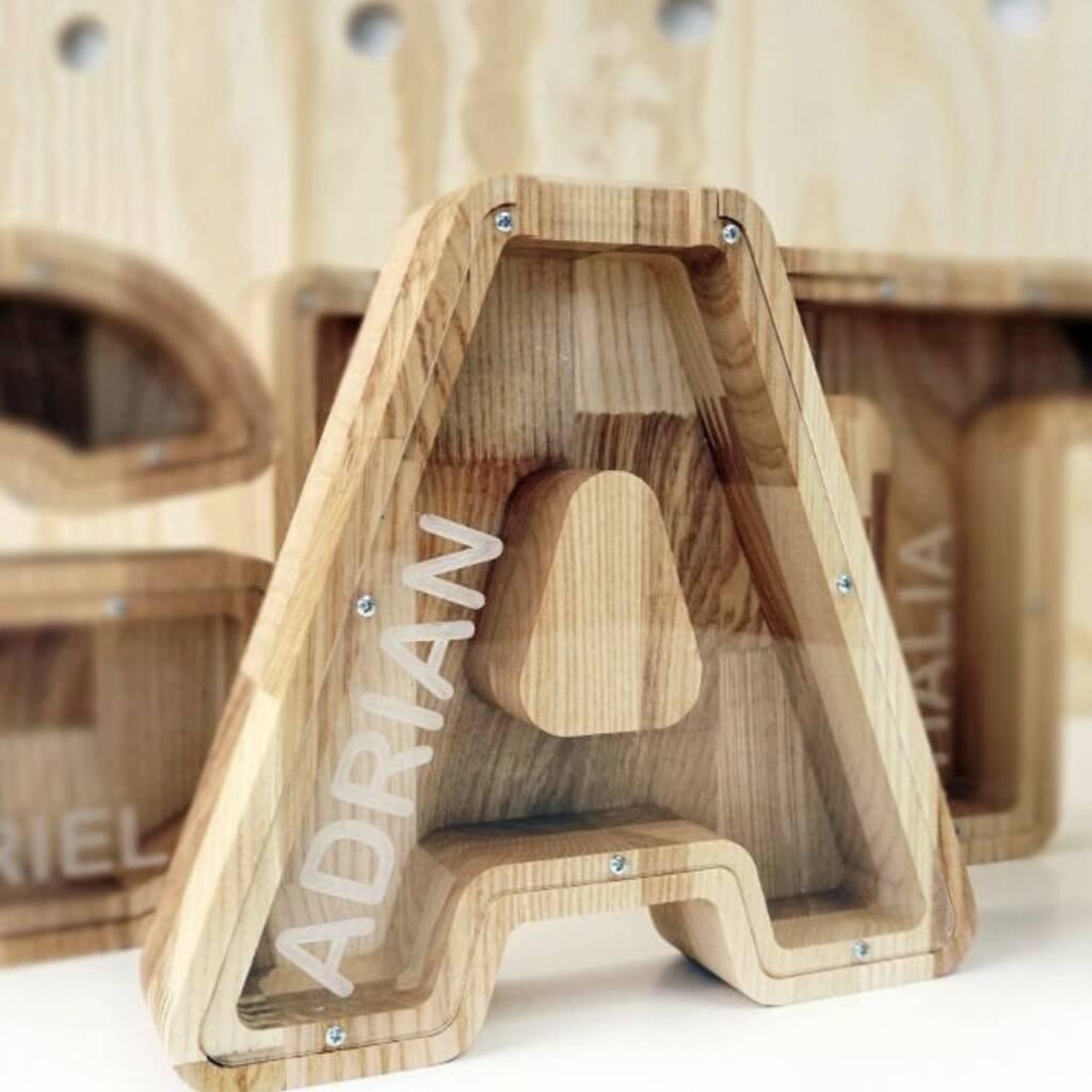 Hand Made Personalised Wooden Letter Money Boxes, 1 of 5