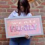 'We Are Family' Framed Handmade Gold Typographic Sign, thumbnail 1 of 6