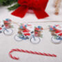 Vintage Christmas Bunting With 15 Santa On A Bike Flag Design, thumbnail 2 of 6