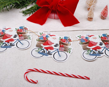 Vintage Christmas Bunting With 15 Santa On A Bike Flag Design, 2 of 6