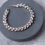 Rose Gold Plated Crystal Leaf Design Tennis Bracelet, thumbnail 1 of 2