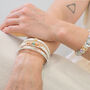 Gold Plated White Multistrand Bracelet With Warm Earthy Pastel Crystals, thumbnail 5 of 6