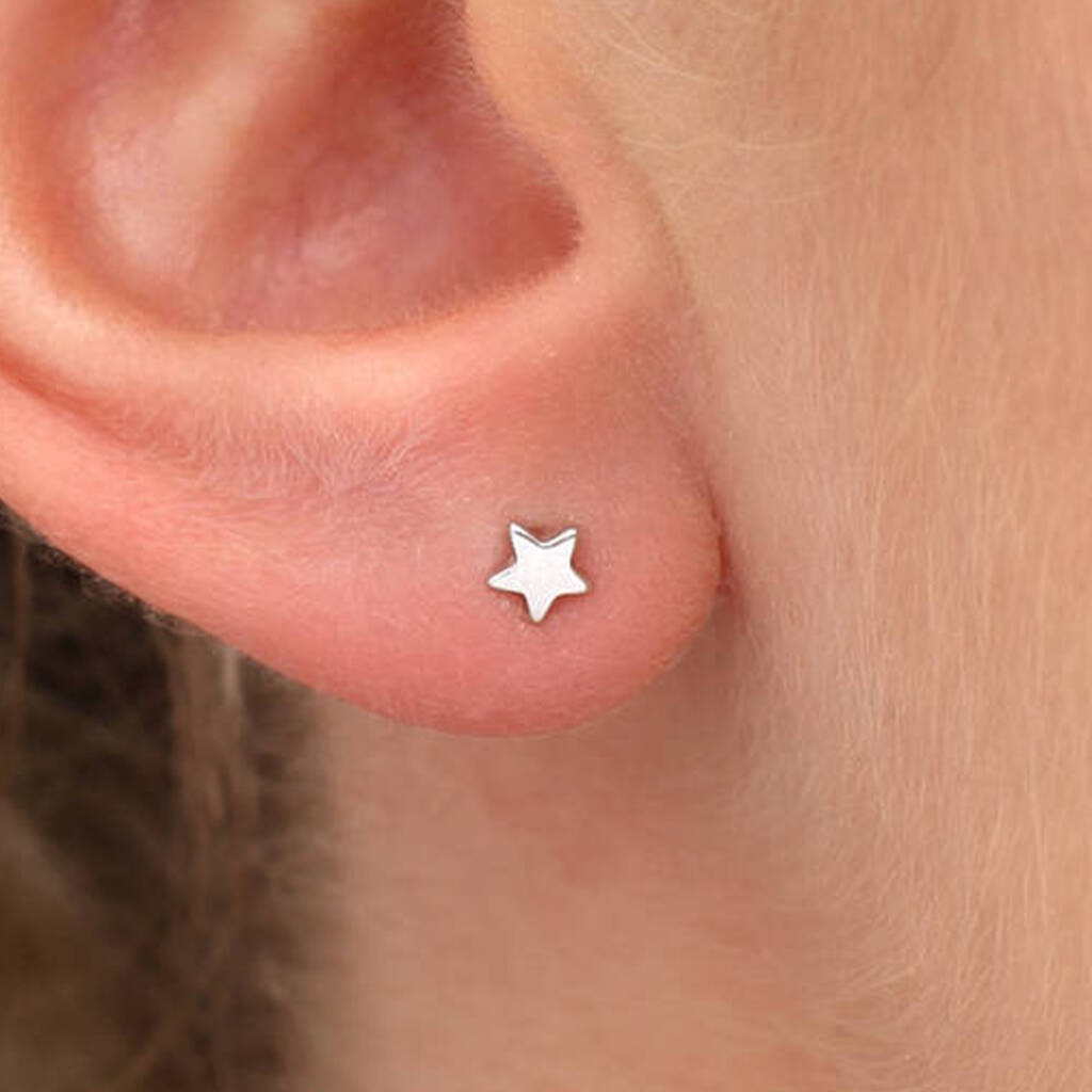 Tiny Sterling Silver Star Stud Earrings, 1 of 2