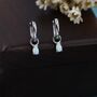 Sterling Silver White Opal Droplet Huggie Hoop Earrings, thumbnail 3 of 10