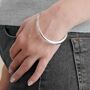 Eclipse Oval Solid Silver Chunky Bangle, thumbnail 1 of 7