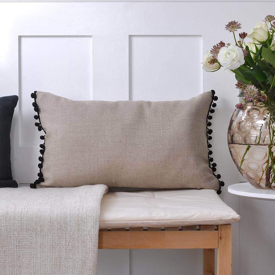 natural fawn linen pom pom cushion by nomadic being