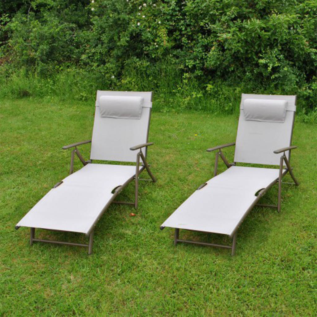 pair of folding sun loungers