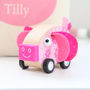 Wooden Pink Pig Toy With Personalised Bag, thumbnail 1 of 4