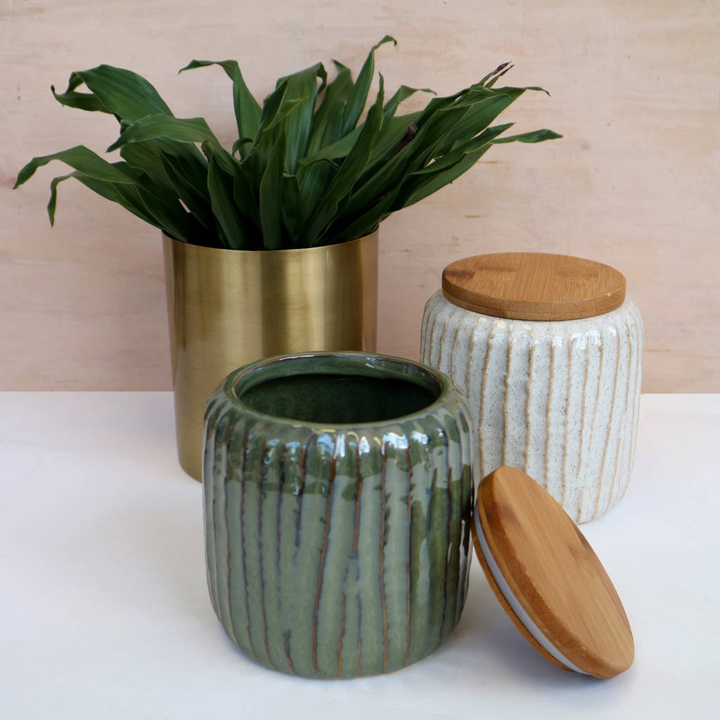 green stoneware jar with wooden lid by posh totty designs interiors