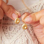Matt 18 K Gold And Silver Pumpkin Seed Earrings, thumbnail 3 of 9