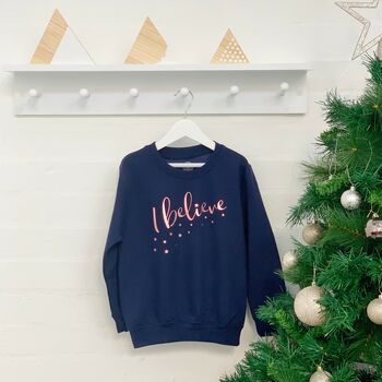 I Believe With Stars Rose Gold Kids Xmas Jumper, 2 of 2