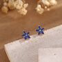 Sterling Silver Blue Cz Flower Stud Earrings, thumbnail 1 of 7