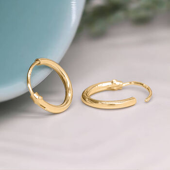 Mini Yellow Gold Plated Huggie Hoop Sleeper Earrings, 4 of 8