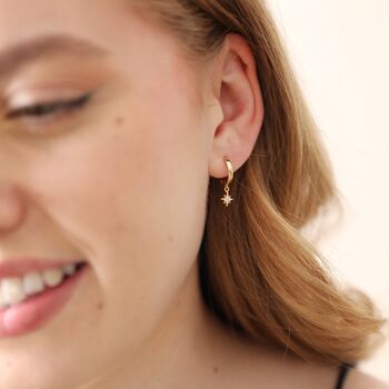 Tiny Star Charm Huggie Hoop Earrings In Gold Plating, 5 of 6
