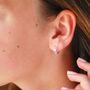Sterling Silver Cut Out Star Huggie Earrings, thumbnail 2 of 5