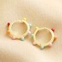Colourful Enamel Pom Pom Huggie Hoop Earrings In Gold, thumbnail 4 of 6