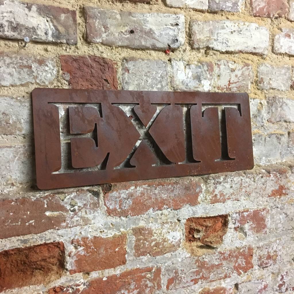 classic rusted metal exit sign by bobo's beard company