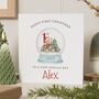 Personalised Baby Boy 1st Christmas Snowglobe Card, thumbnail 1 of 7