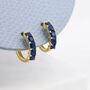 Minimalist Sapphire Blue Cz Huggie Hoop Earrings, thumbnail 3 of 11