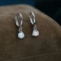 Sterling Silver White Opal Dot Huggie Hoop Earrings, thumbnail 4 of 9