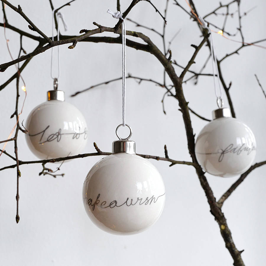 set of three white porcelain christmas baubles by lilac set of three white porcelain christmas baubles by lilac