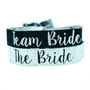 Team Bride Silver And Black Hen Party Wristbands, thumbnail 1 of 9