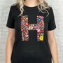 Floral Initial Personalised On Black T Shirt, thumbnail 1 of 2