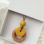 Mustard Nursing And Teething Engraved Pendant, thumbnail 1 of 2