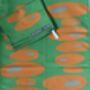 Pebbles Tea Towel Bright Green / Orange, thumbnail 3 of 3