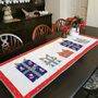 Christmas Table Runner With Gift Design In Reds, Greens, thumbnail 1 of 9