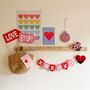 Pink And Red Felt Personalised Bunting Garland, thumbnail 1 of 5