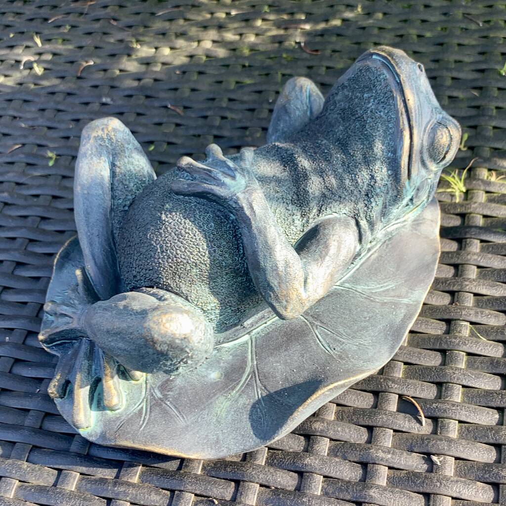 reclining frog statue