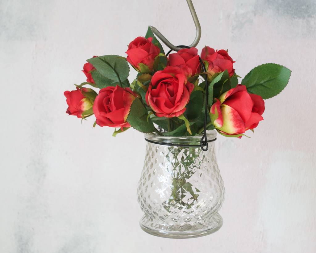 mini faux roses in coloured vase by abigail bryans designs