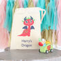 Wooden Dragon Pull Back Toy And Personalised Gift Bag, thumbnail 1 of 4