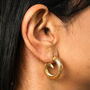 Stainless Steel Swirl Hoop Earrings In Gold, thumbnail 3 of 3