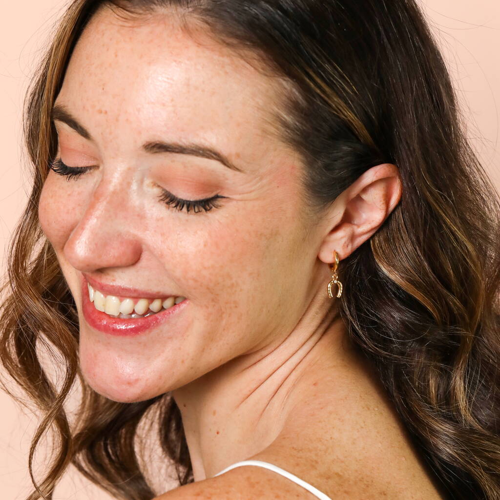 Crystal Horseshoe Huggie Hoop Earrings In Gold, 1 of 3