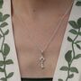 Sterling Silver Key Charm Necklace, thumbnail 1 of 6