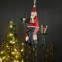 Santa On A Penny Farthing Hanging Christmas Decoration, thumbnail 2 of 4