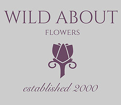 Purple wild about flowers floral logo, established 2000