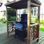 Wooden Garden BBQ Shelter With Trellis Sides, thumbnail 1 of 7