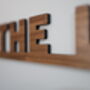 The Loo Sign: Walnut Wood Door Topper With Adhesive Dots, thumbnail 7 of 7